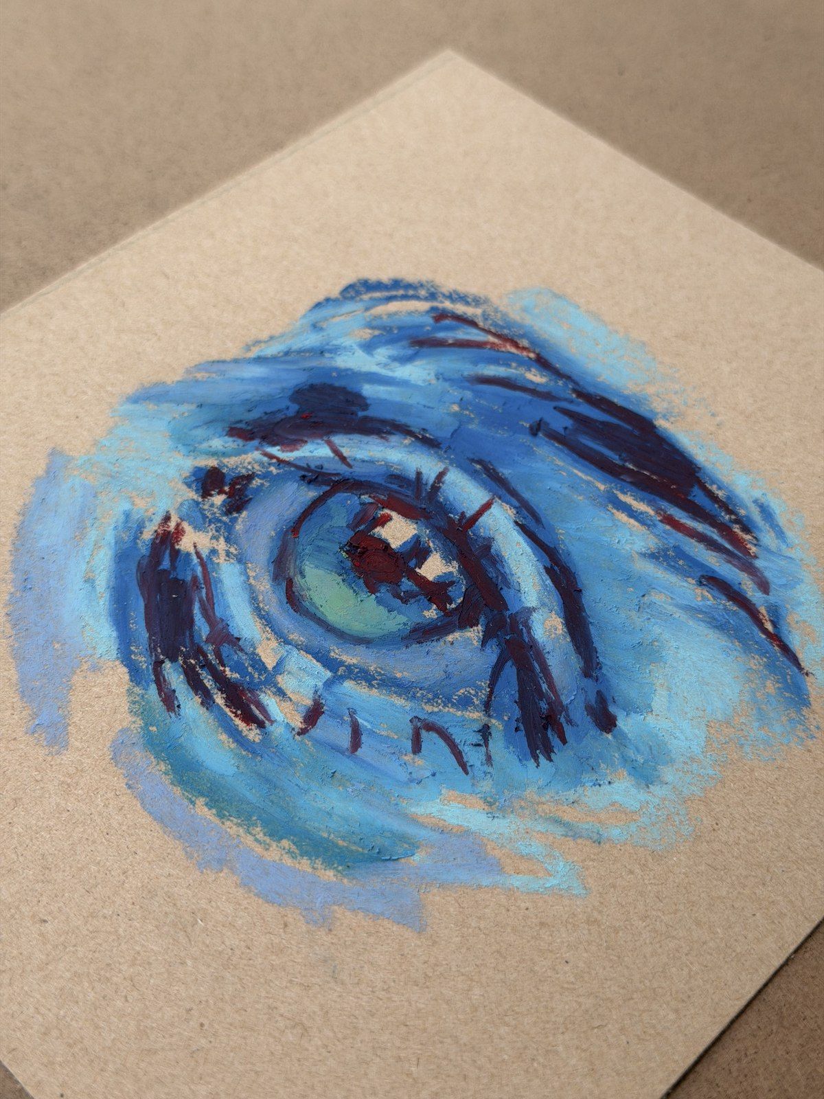 Close-up oil pastel study of a blue eye