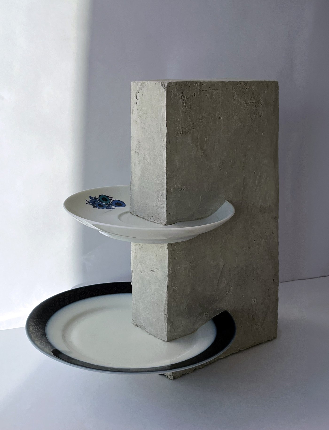 Open project: Connecting Cultures, full piece with plates resting on the concrete block
