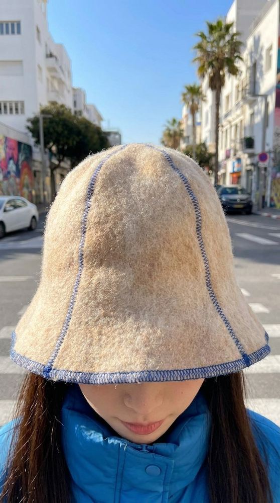 Bucket hat made from shed dog fur, texture and stitching detail