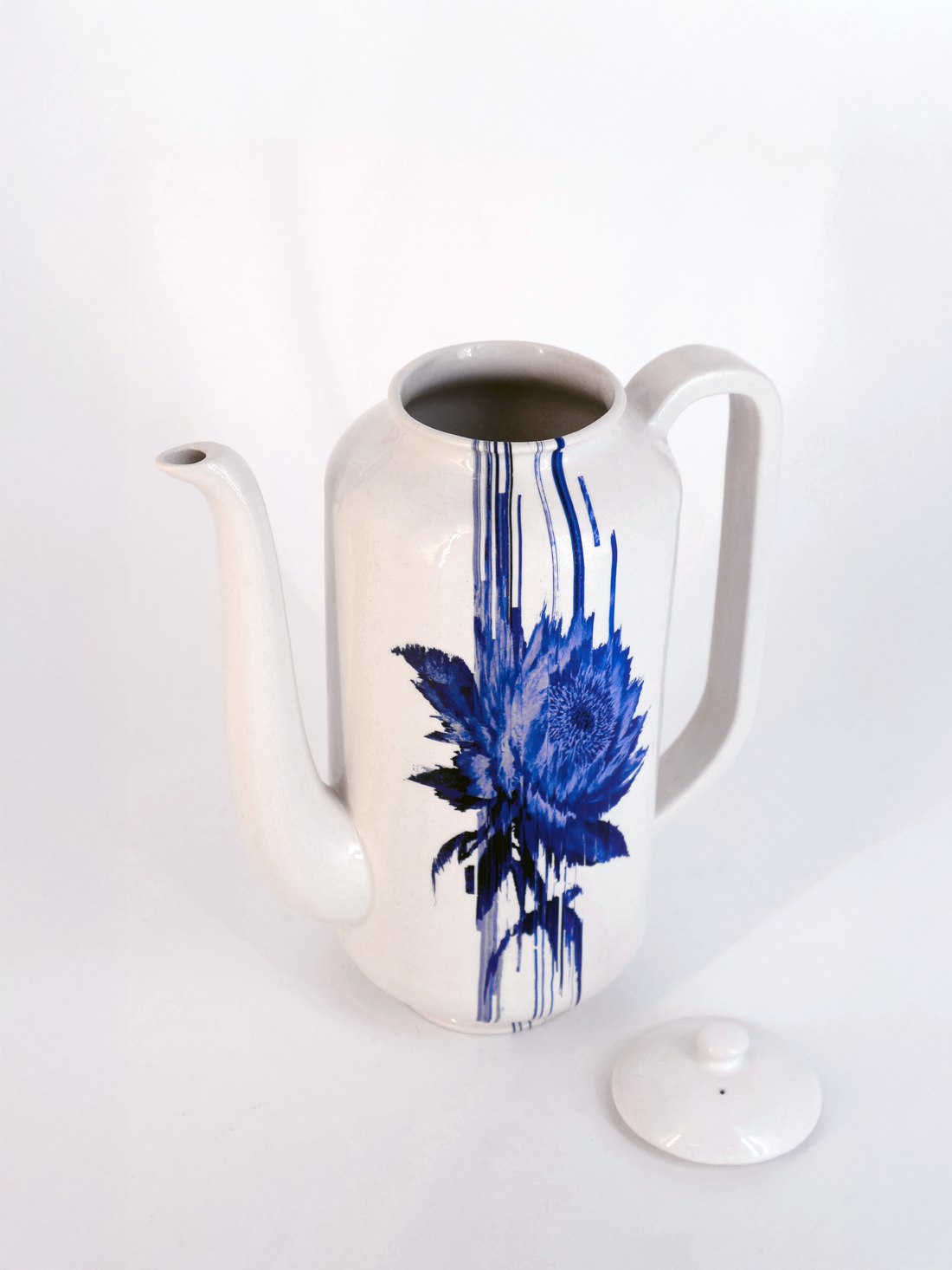 Open project: Glitched Teapot — white ceramic teapot with a glitched blue floral decal